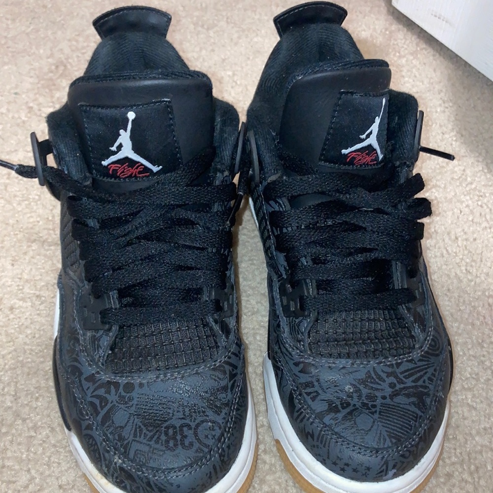 Back and gold air Jordan 4s